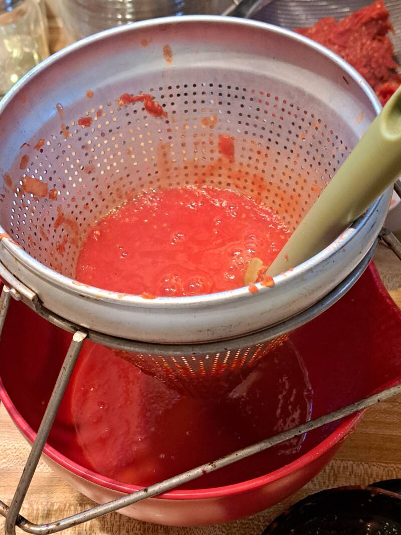 Using a sieve to remove the solid bits