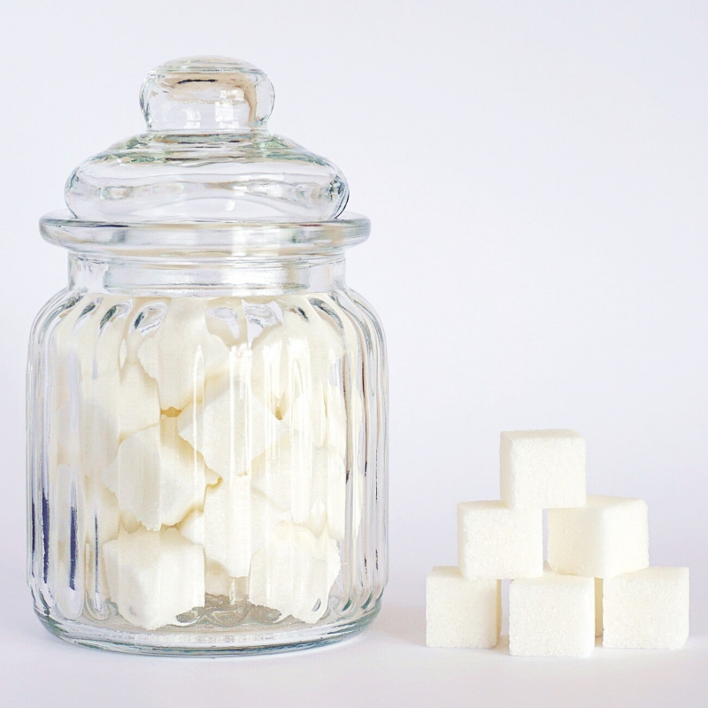 a jar with sugar cubes