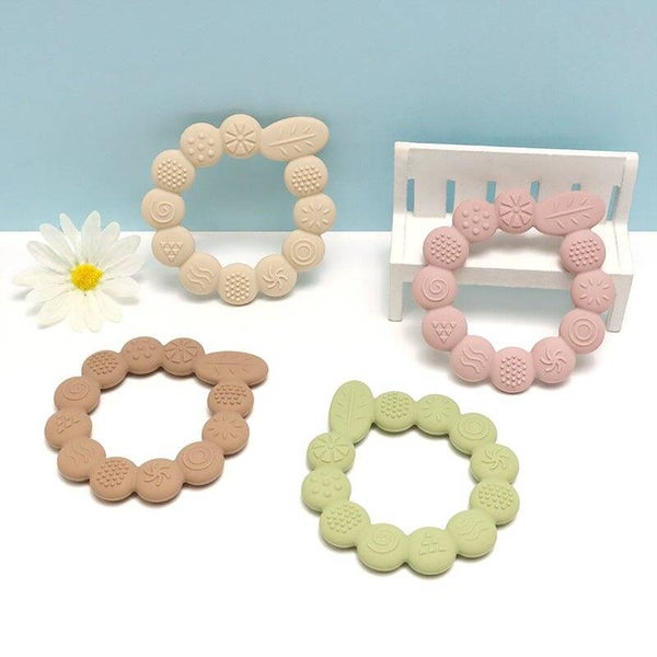 Anneau de dentition en silicone avec textures Feuille