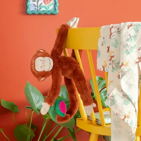 Singe Mochica d'activités à suspendre