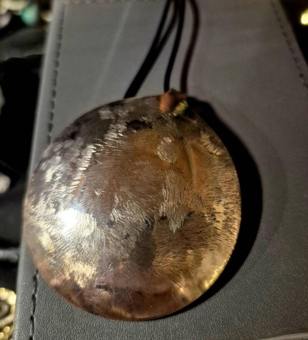 Collier ''brut'' surcyclé d'une cuillère à sauce