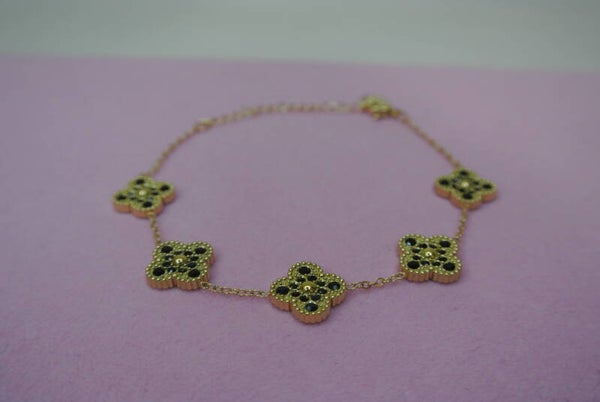 ARMBAND KLAVER ZWART MET GOUD - GOUD