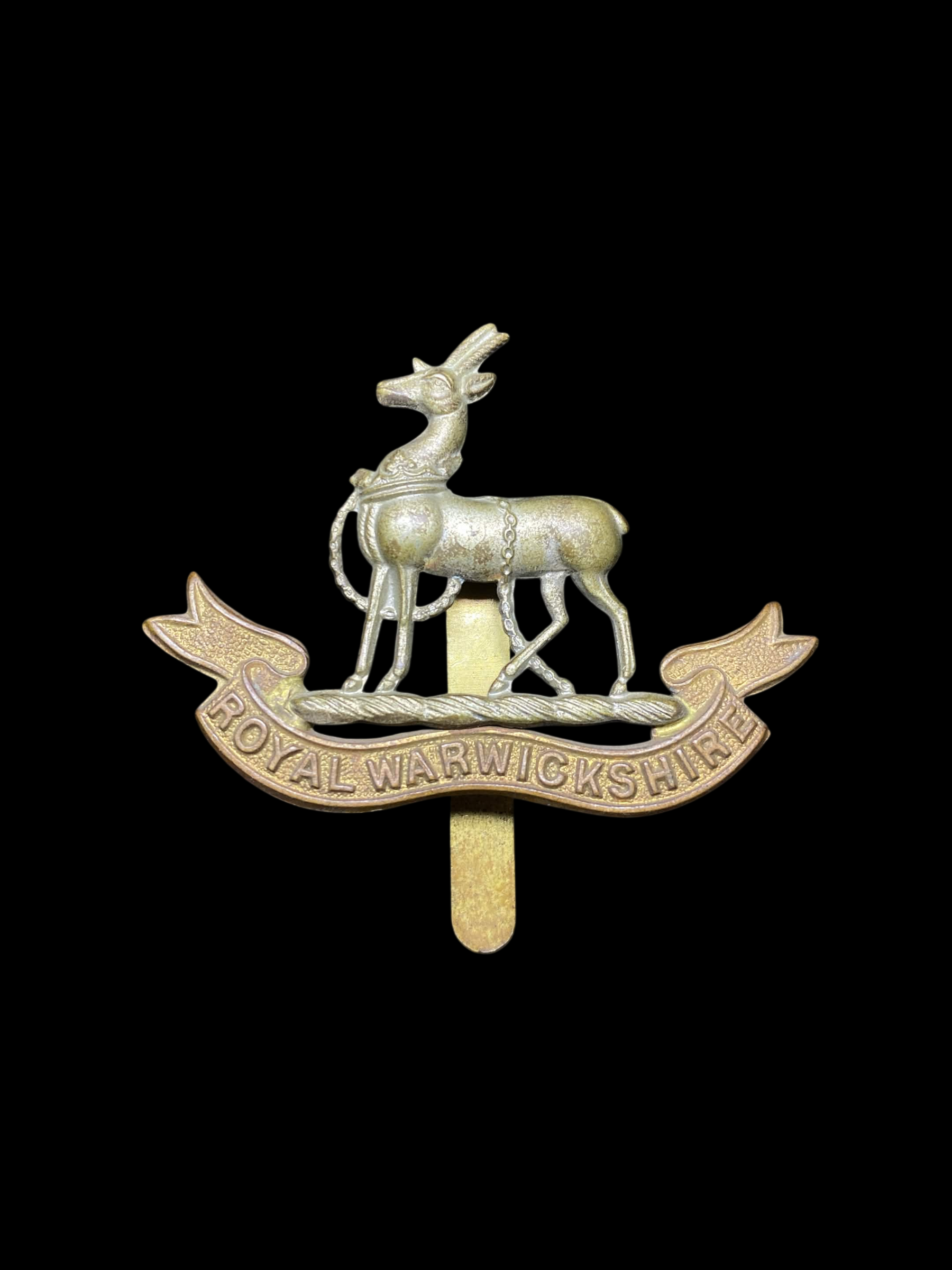 Insigne de casquette (Cap Badge) du Royal Warwickshire Regiment