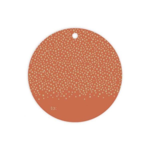 Ronde label cognac met gouden stippen.