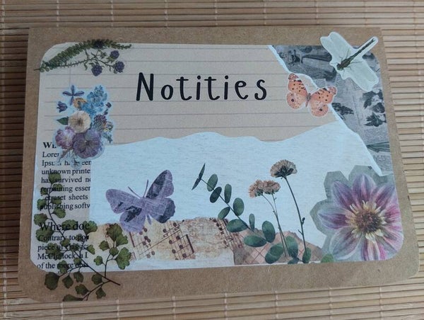 Notitieblok paarse vlinder