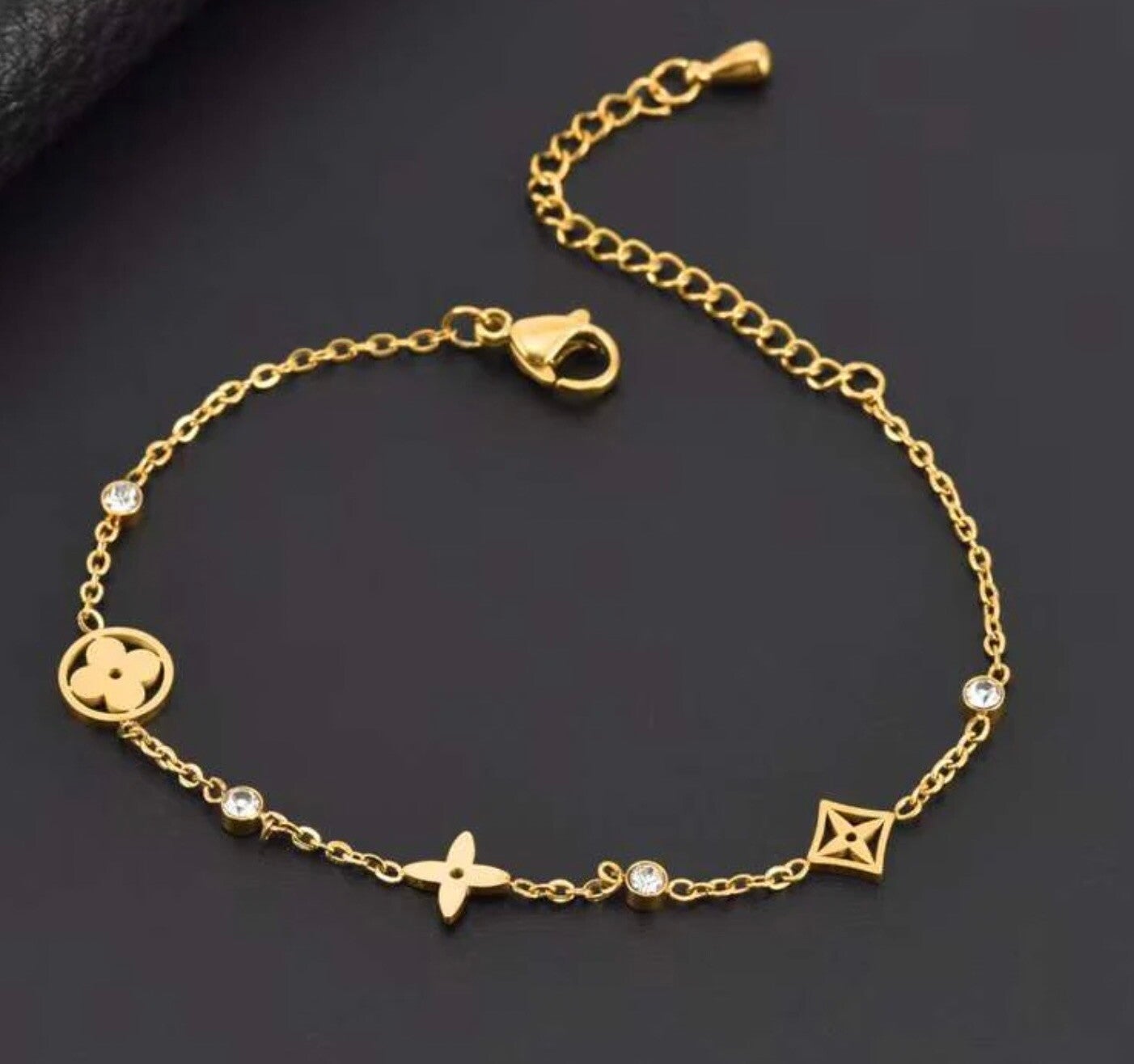Celestial Charm: Gold Star Sparkle Bracelet