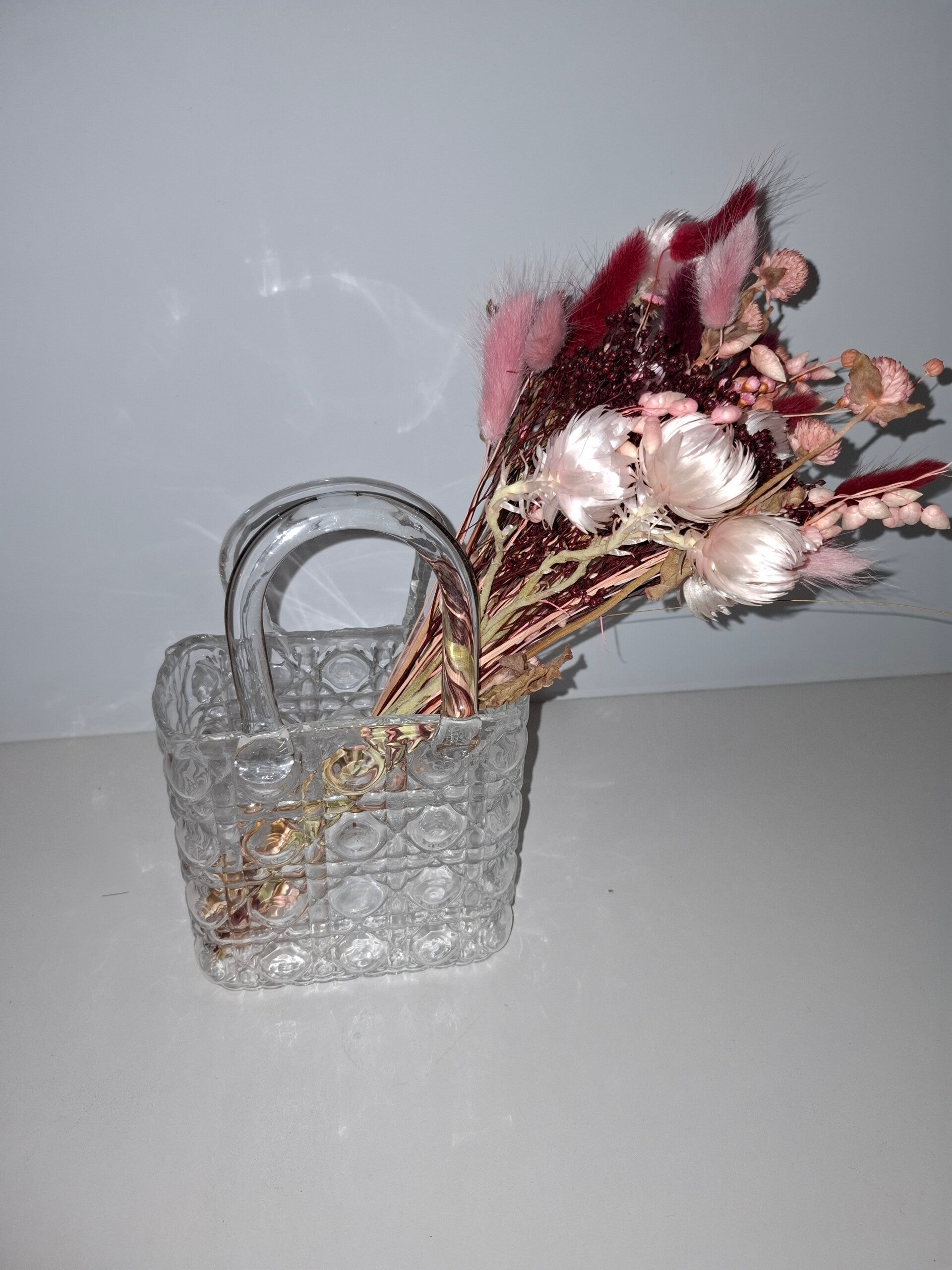 Glazen handtas met droogbloemen