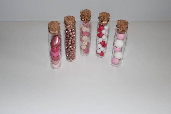 Pipet in glas 10 cm roze