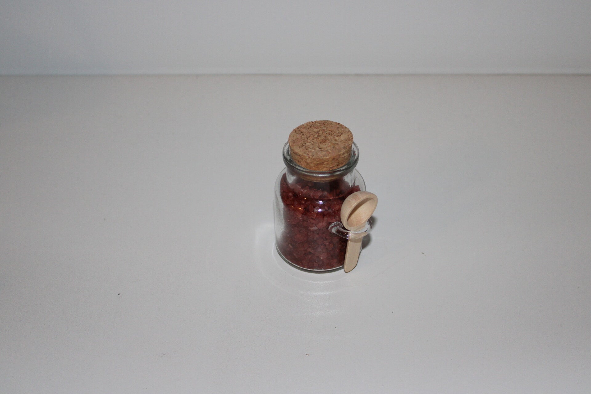 Glazen potje met badzout in terracottakleur