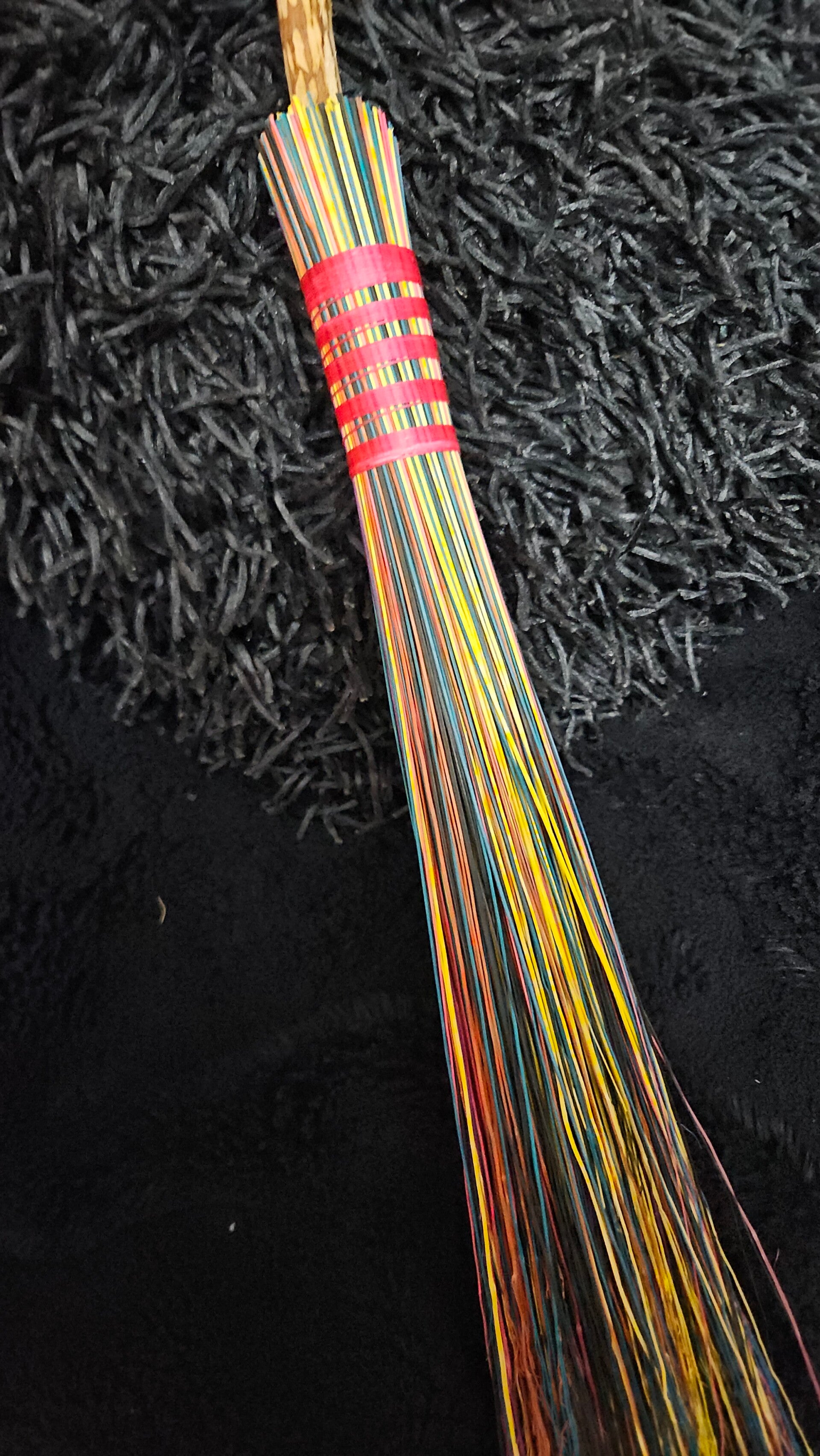 Multicoloured cobwebber / witchy besom