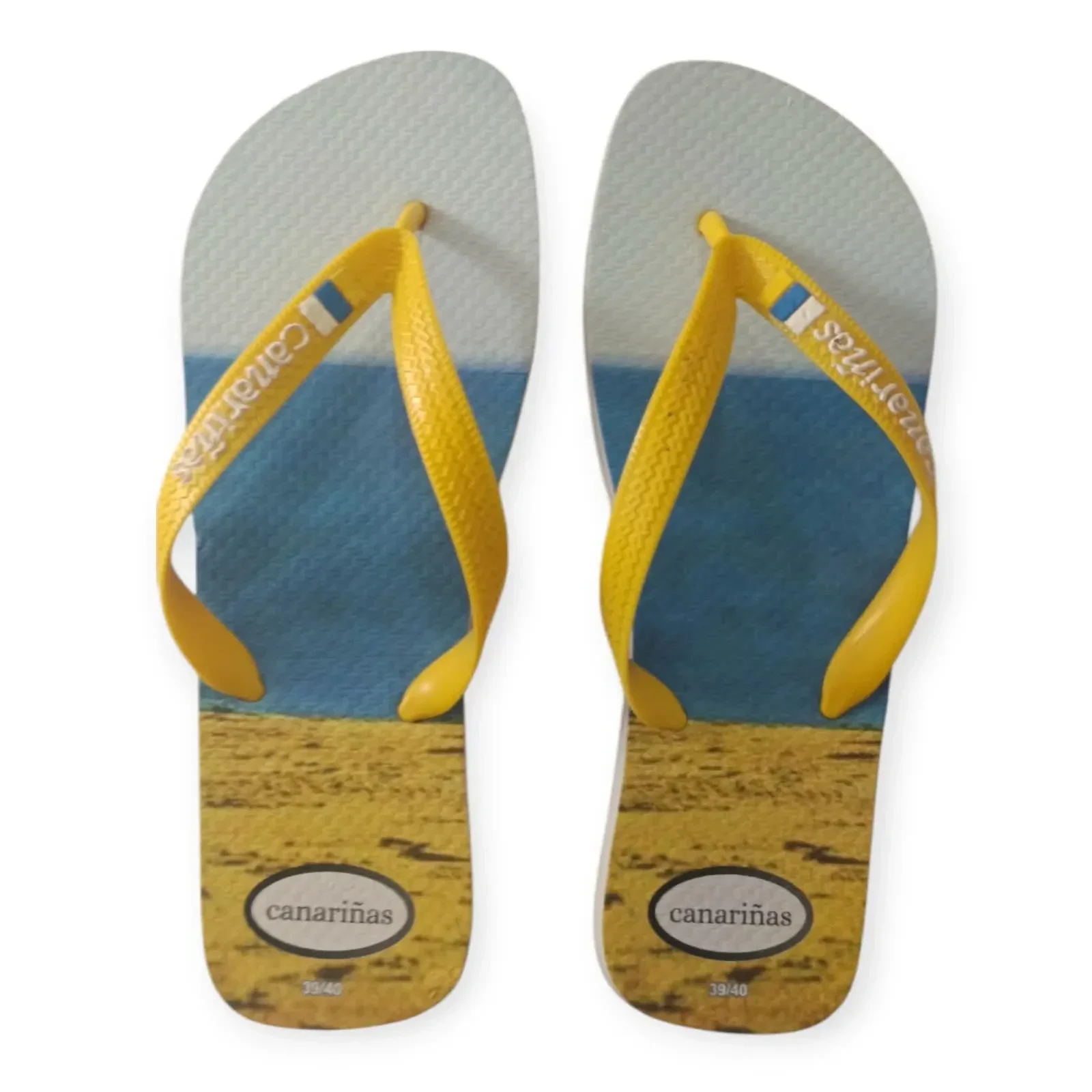 Calzado canario oficial Canariñas con colores de la bandera, ideal para el turismo en Canarias.