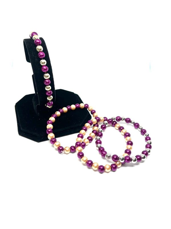 Paarse kralenarmband (S) met parelmoer, goud- of zilverkleurige details