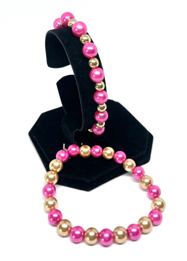 Roze kralenarmband (M) met parelmoer, of gouden details
