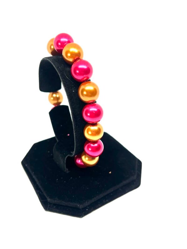 Roze kralenarmband (L) met parelmoer kleurige details