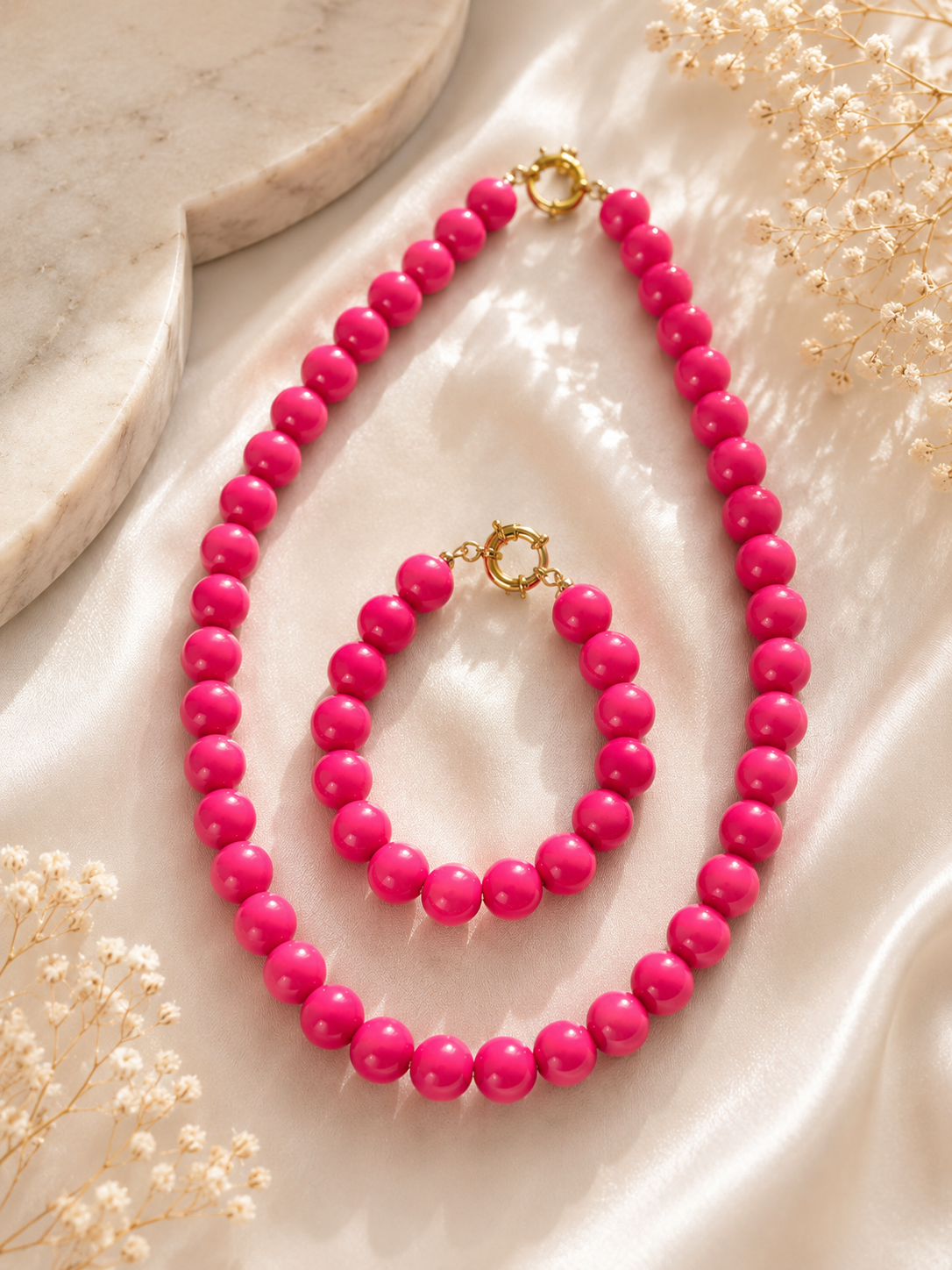 Roze kralenketting