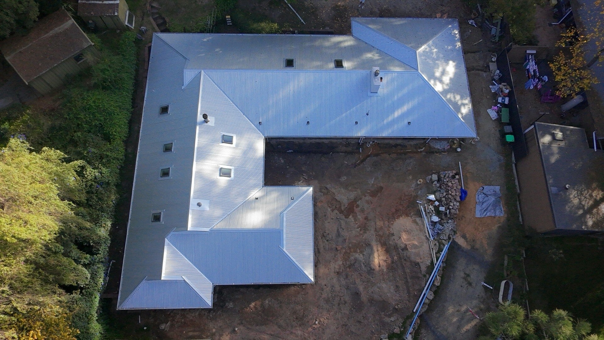 Aerial view of a completed Colorbond steel reroof on an Aldgate home in the Adelaide Hills