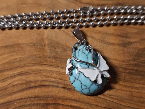 Turquoise vlinder hanger