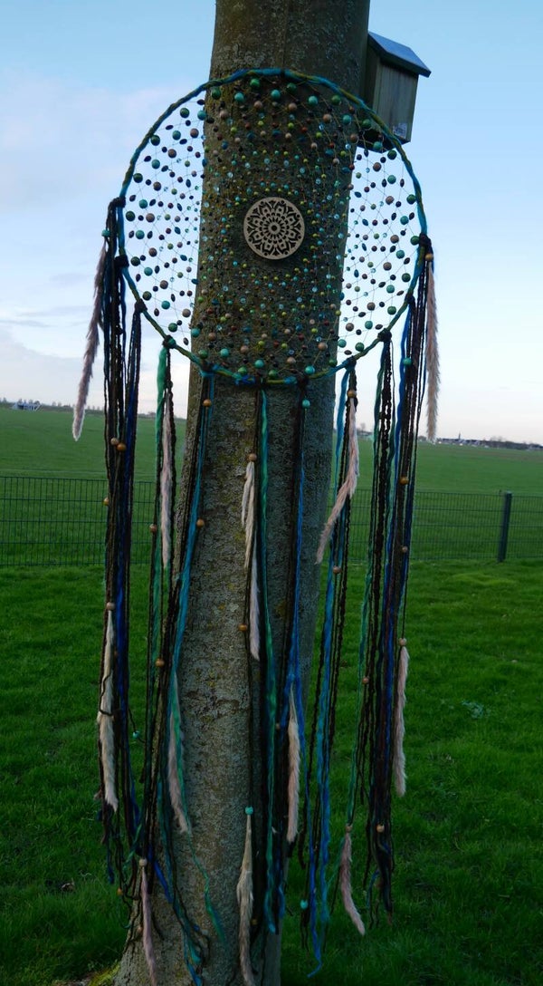 Dromenvanger. Groen blauw.