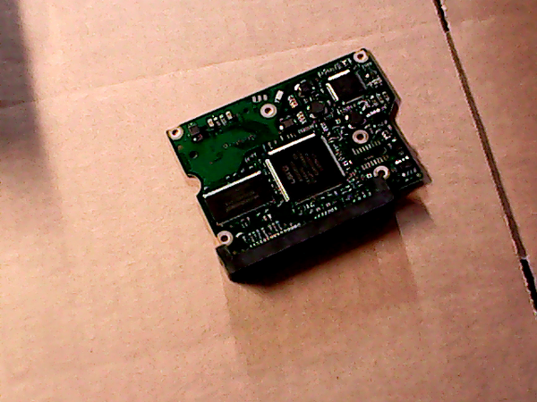 PCB 100511 100535704 REV B ST3160318AS FIRMWARE HP34 9SL13A-021