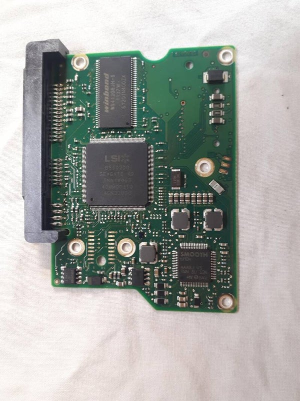 PCB 102803 100535704 REV C ST3250312AS 9YP131-519 FW JC47 CN-0V174X DATE 12143