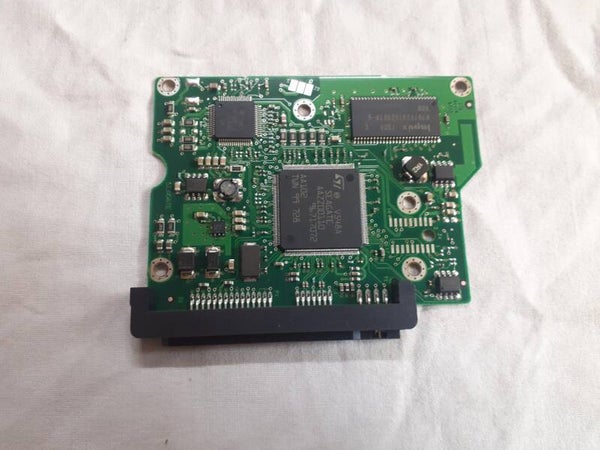 PCB 102873 100442000 REV A SEAGATE ST3250410AS 9EU142-567 FW 3.AAA DATE 08102