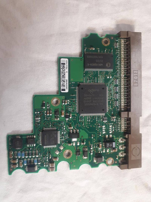 PCB 103032 100291893 REV A SEAGATE ST3160021A 9W2001-630 LEVEL 9KPM1 CODE C5O-02