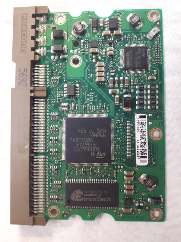 PCB 103161 100354297 REV A SEAGATE ST3200826A 9Y7289-066 FW 3.03 DATE 06015
