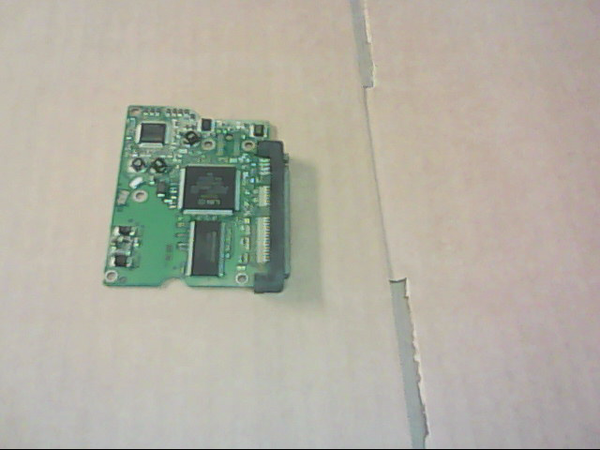 PCB 101954 100504364 REV B MAXTOR STM3320614AS 9HM16C-327 FW MC1J?