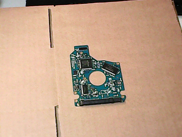 PCB 200298 G002706A MK6465GSXN HDD2J11 B UL01 T 010 A0/GH101M