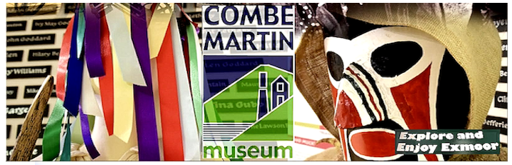 The photo is a vibrant collage featuring the Combe Martin Museum sign, colorful ribbons, and a striking theatrical mask — celebrating local heritage, creativity, and regional pride.