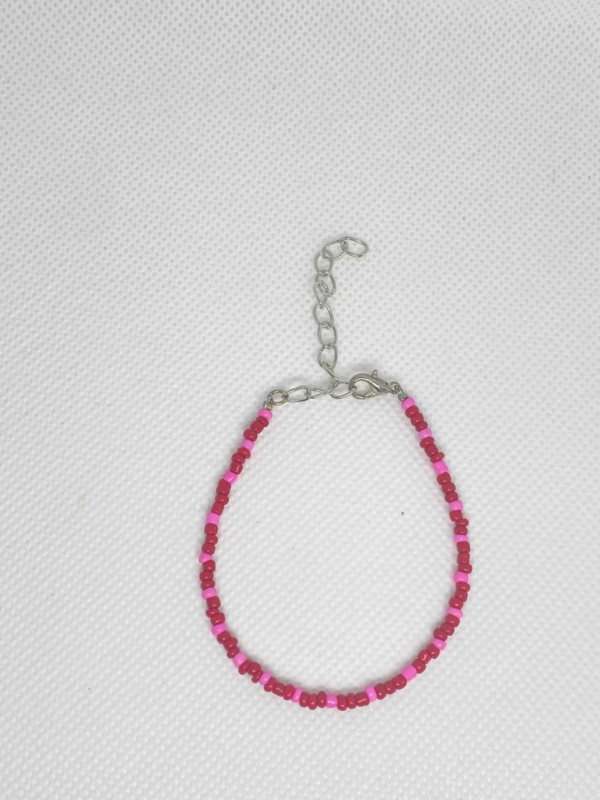 Armband zilver sluitinkje - rood met roze