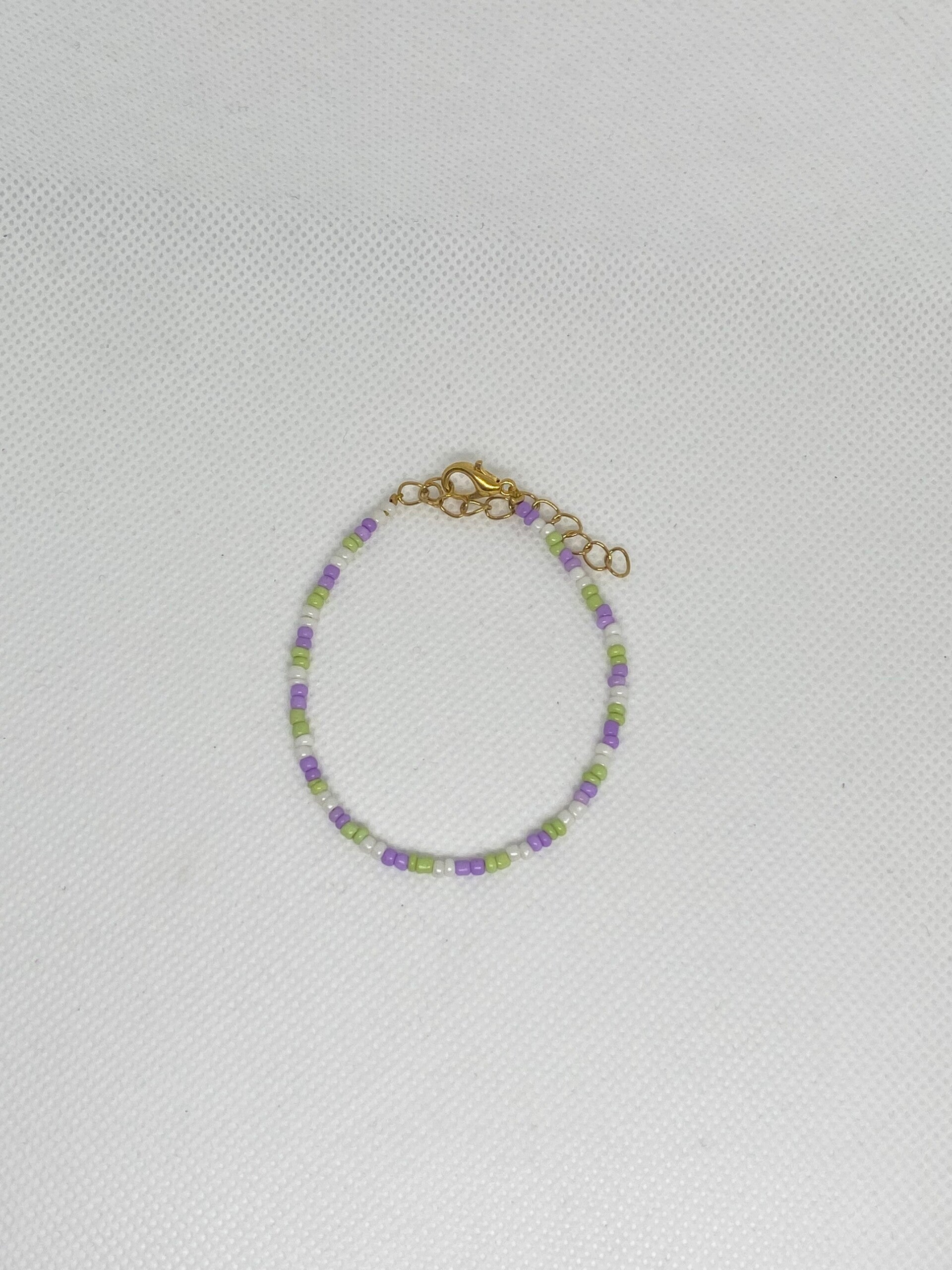 Armband goud sluitinkje - groen en paars