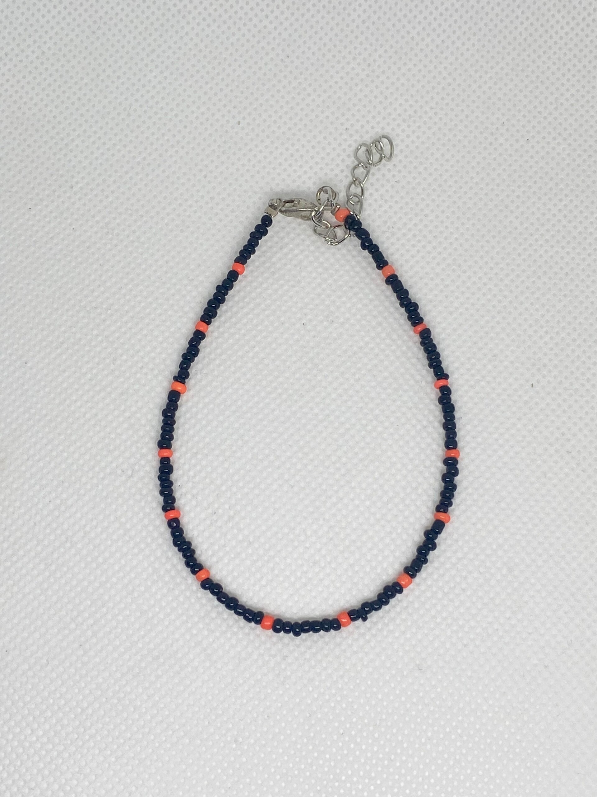 Enkelbandje zilver sluitinkje - Zwart met oranje