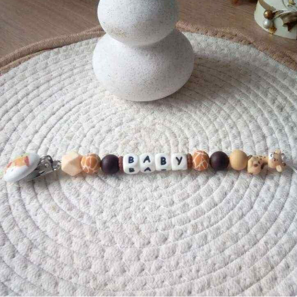 attache tétine girafe