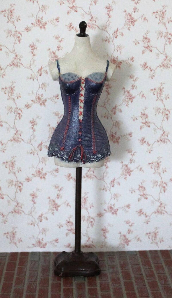 mannequin dressed in purple