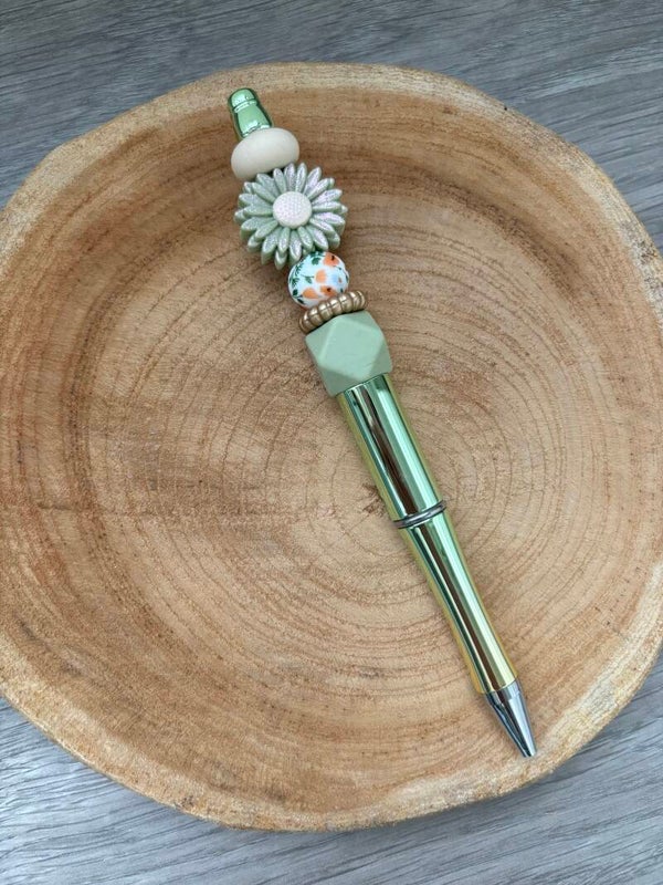 pen glossy groene bloem