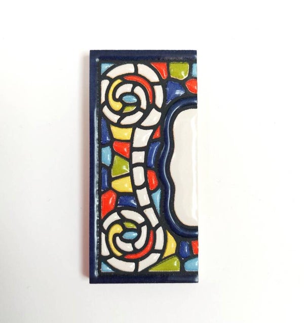 Huisnummer Girona - zijkant links