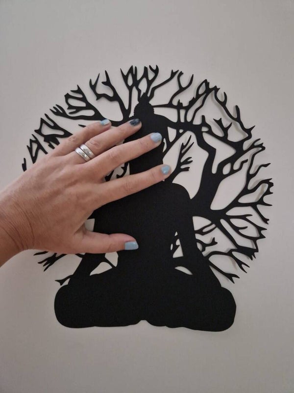Buddha met takken