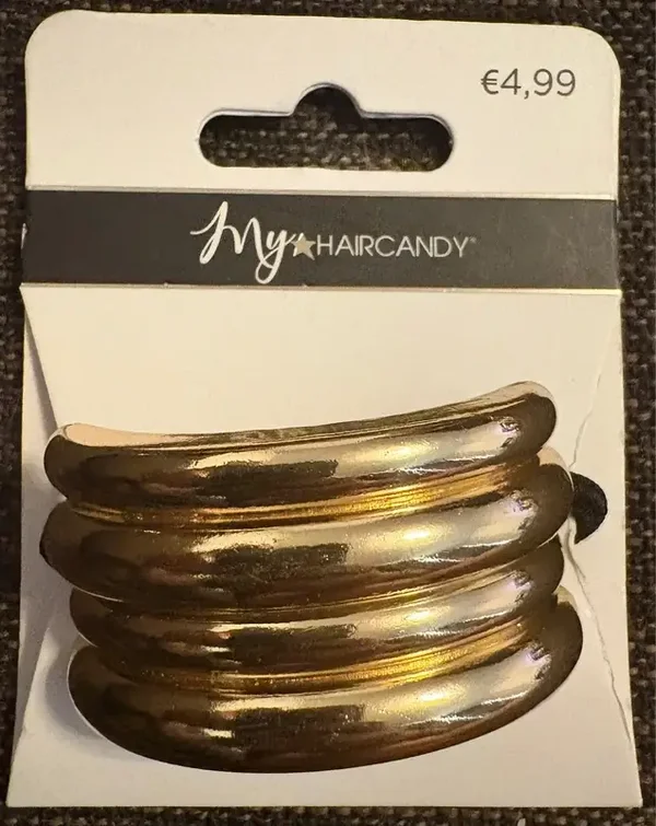 Gouden haarklem aan elastiek