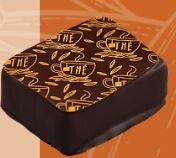 Carré de chocolat noir avec inscription THE sur le dessus