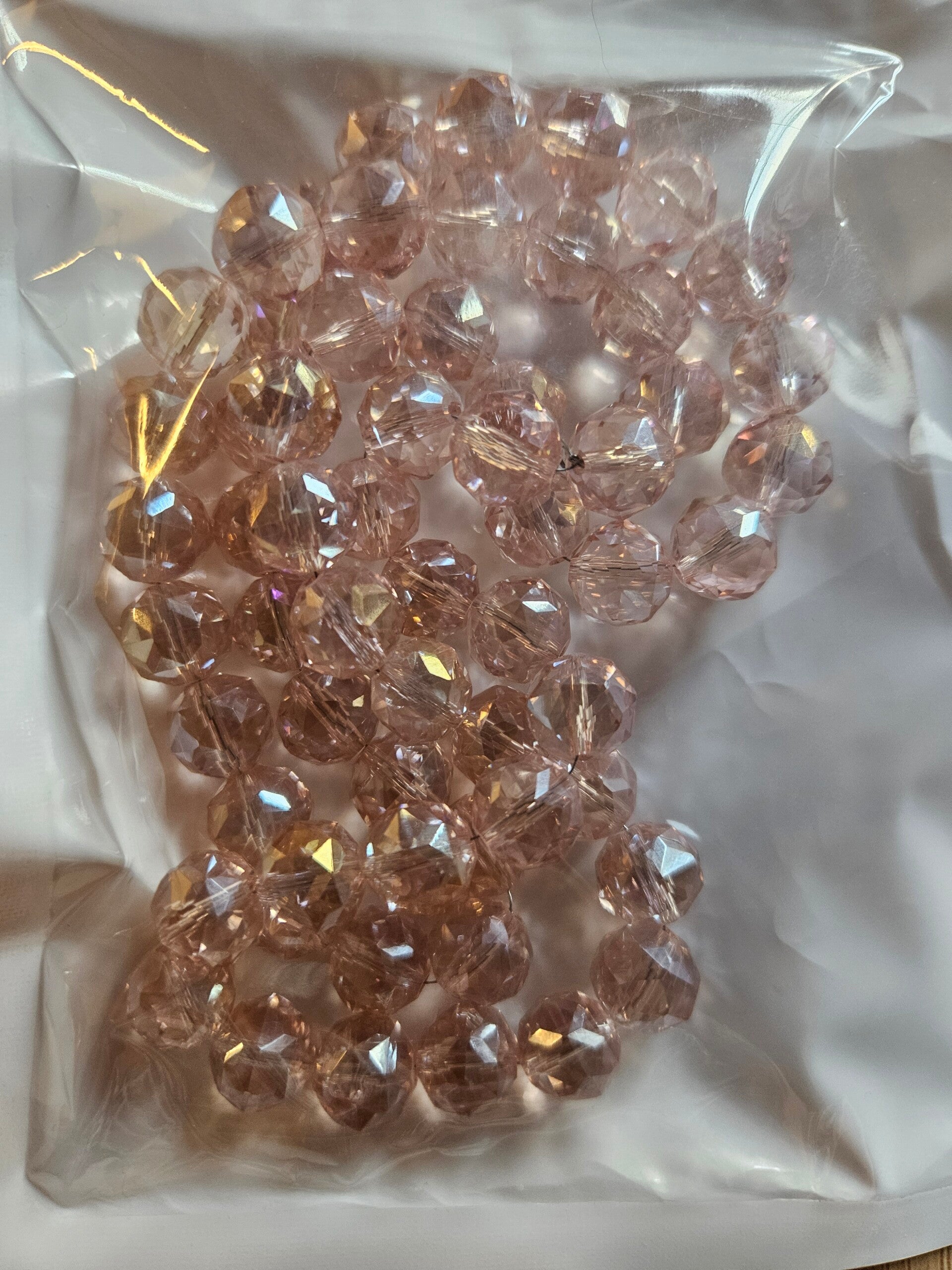 Fasetterade glaspärlor - Ljusrosa 10 mm