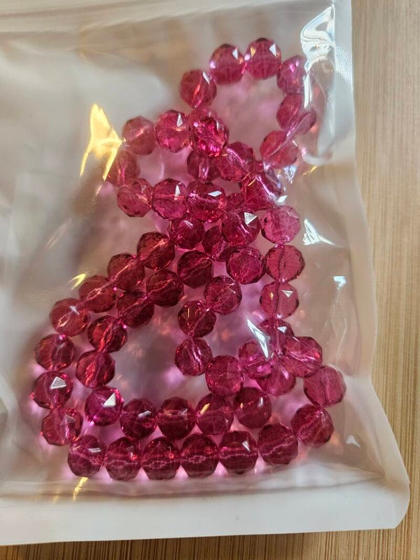 Mörk rosa 10 mm fasetterade glaspärlor