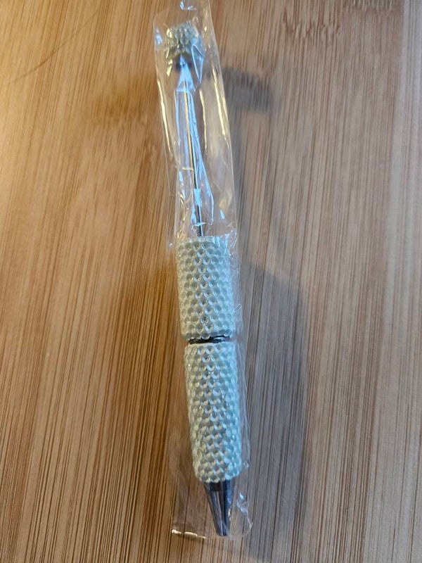 Kräm vit penna