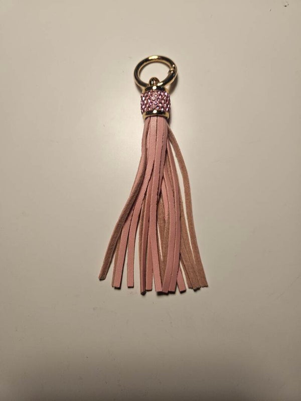 Tofs/nyckelring med strass i rosa färg