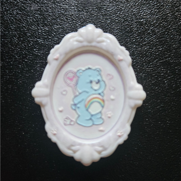 Pärla med genomgående hål - care bear motiv