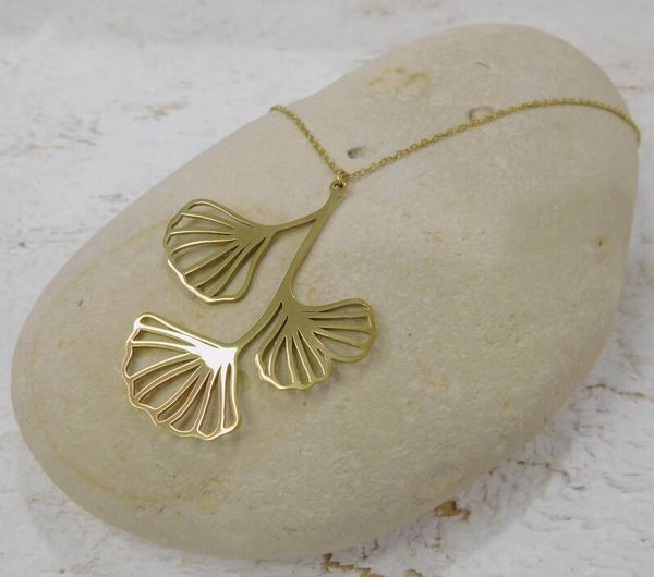 Collier acier ginkgo - doré
