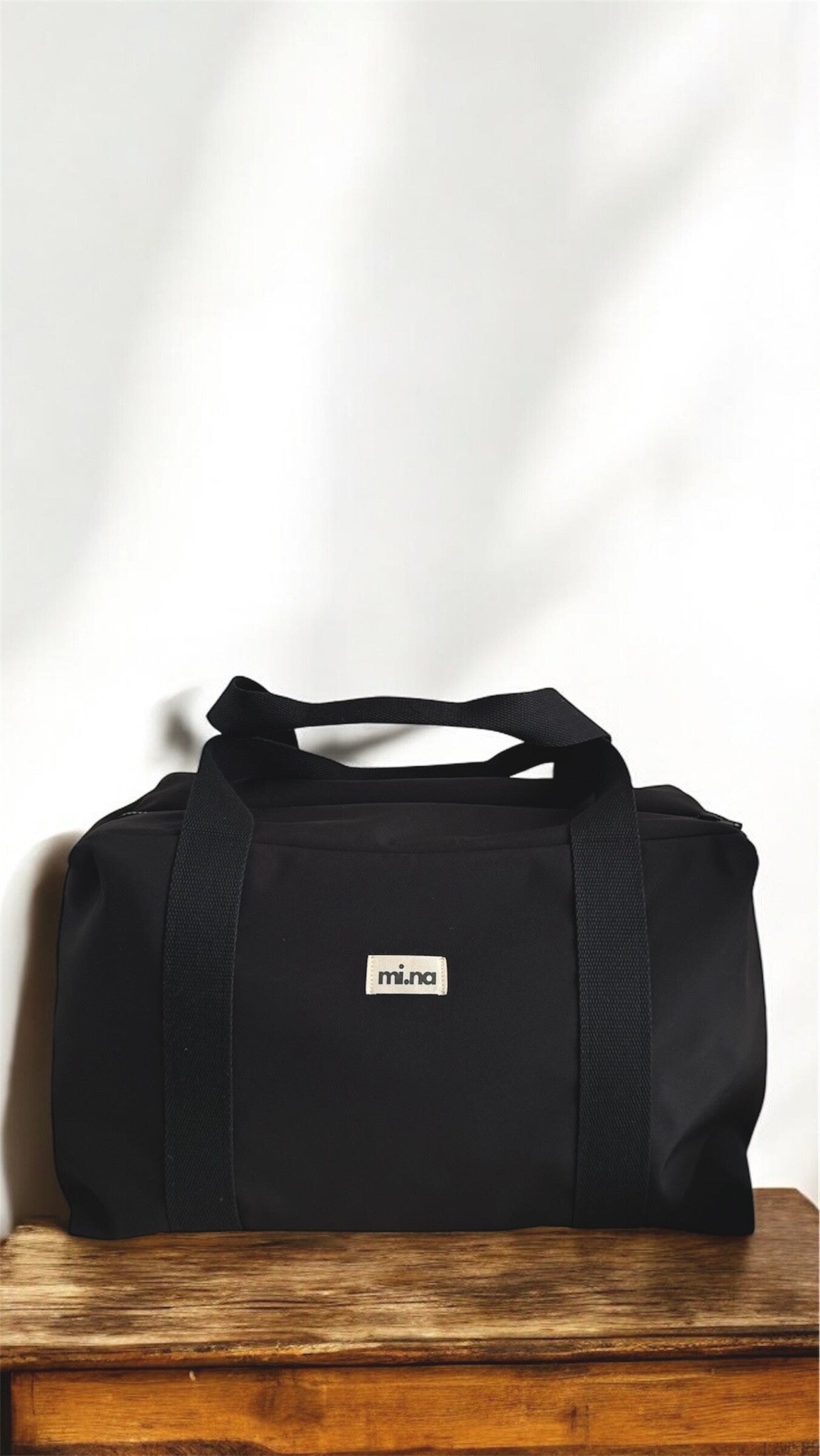 TRAVEL BAG DÉPERLANT EVI NOIR