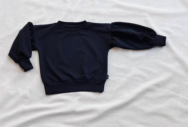 Zwarte sweater pofmouw
