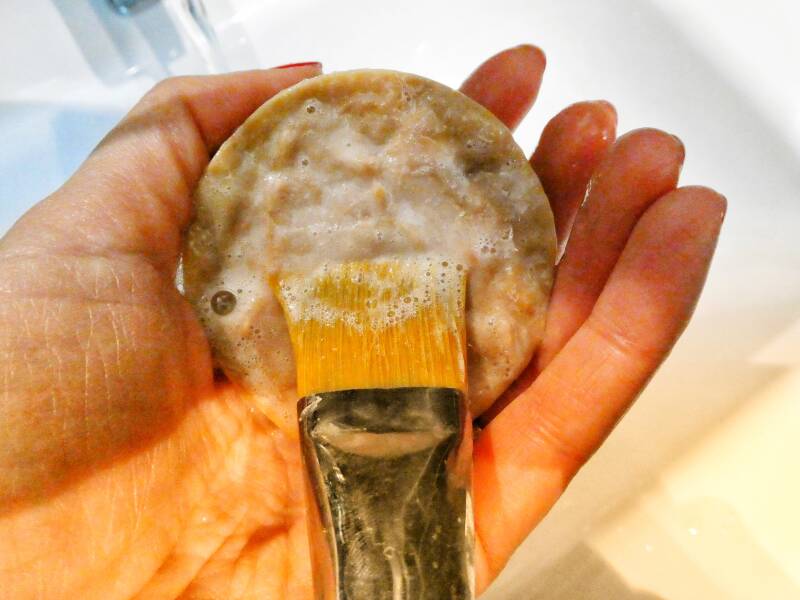 Washing paint brush with soap