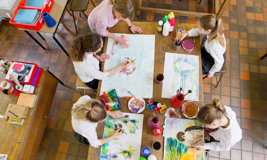 Group of people learning about art